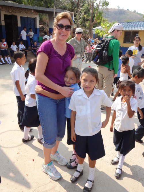 May Crenshaw with school kids.
