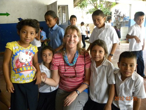 Mechele Howard with kids at hygiene training session.