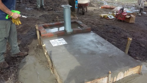 Waiting for the concrete to harden.