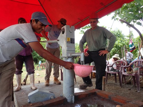 Everyone was excited to see clean water flow from the well.